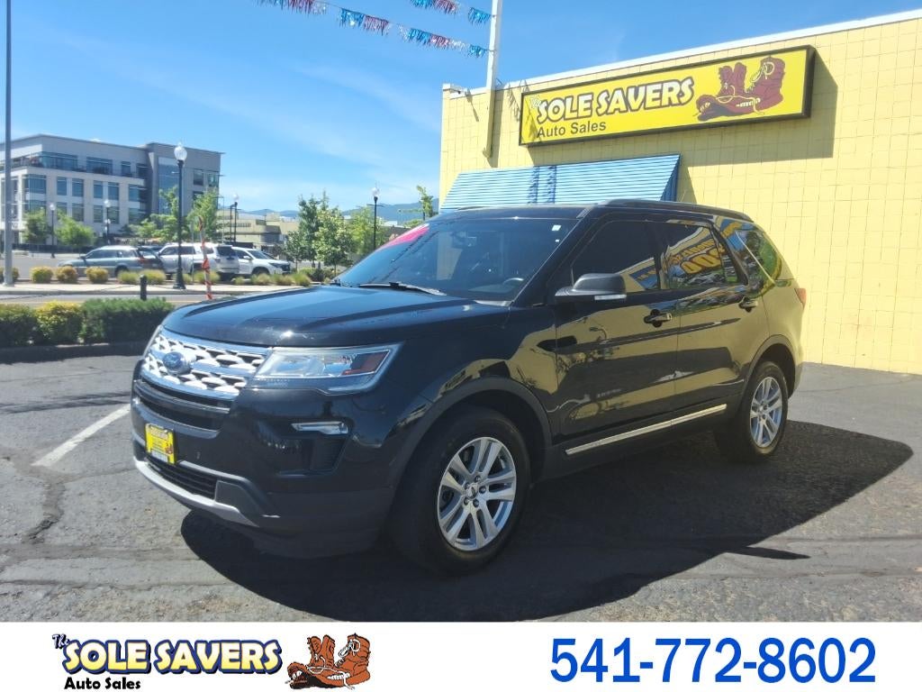 2019 Ford Explorer XLT in Black — front three-quarter view