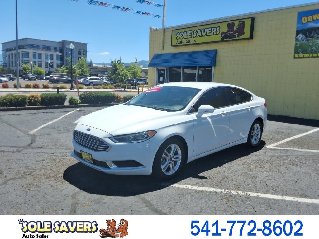 2018 Ford Fusion SE in White — front three-quarter view