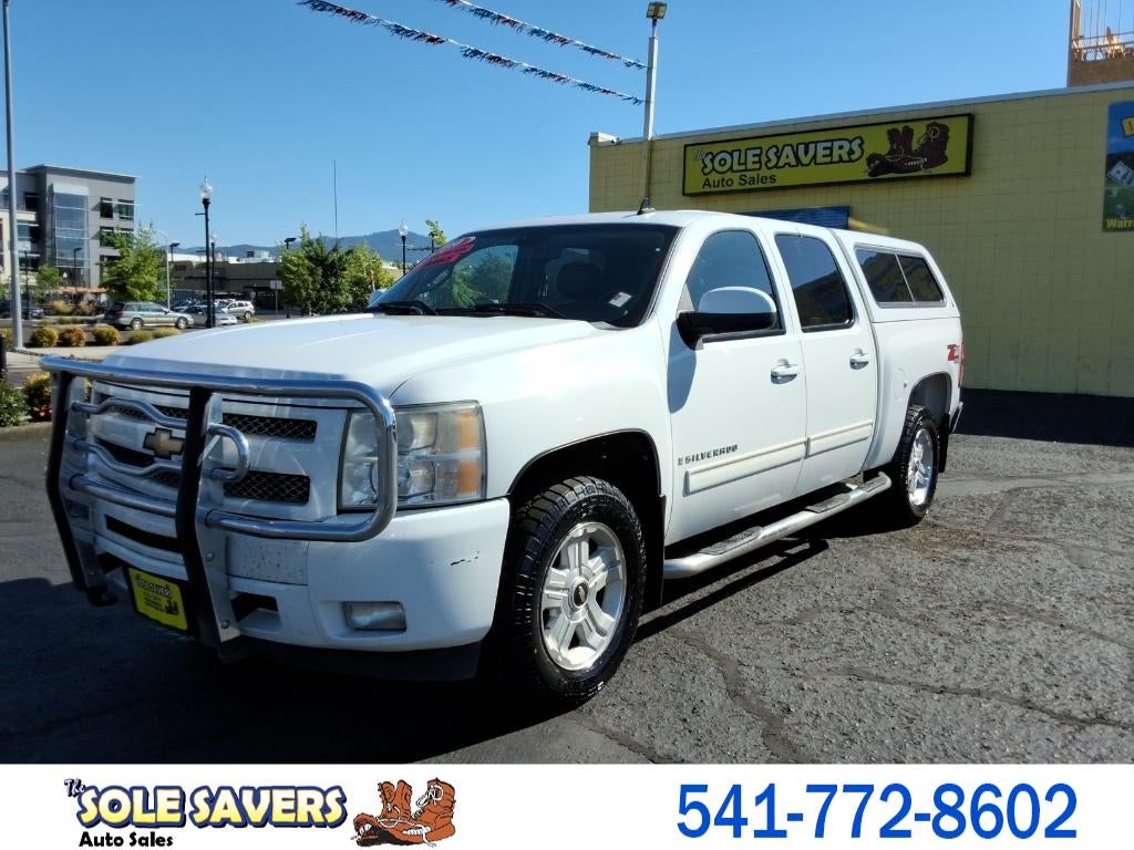 2009 Chevrolet Silverado LTZ in White — front three-quarter view