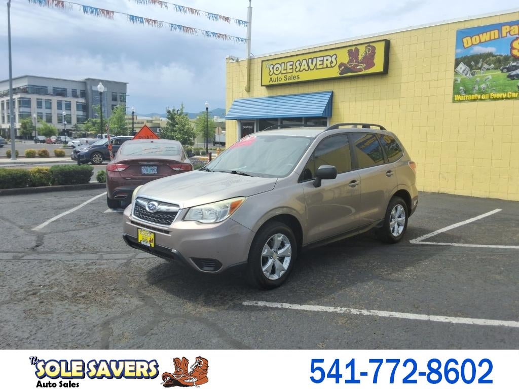 2016 Subaru Forester 2.5i Premium in Brown — front three-quarter view